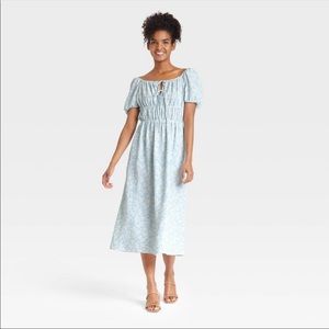 Woman’s puff short Sleeved smocked dress